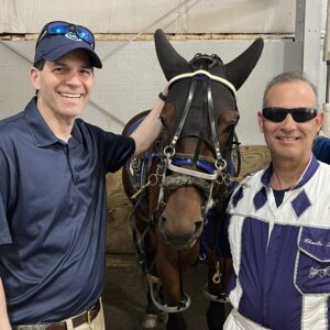 GFG-Charlie in paddock with member and horse